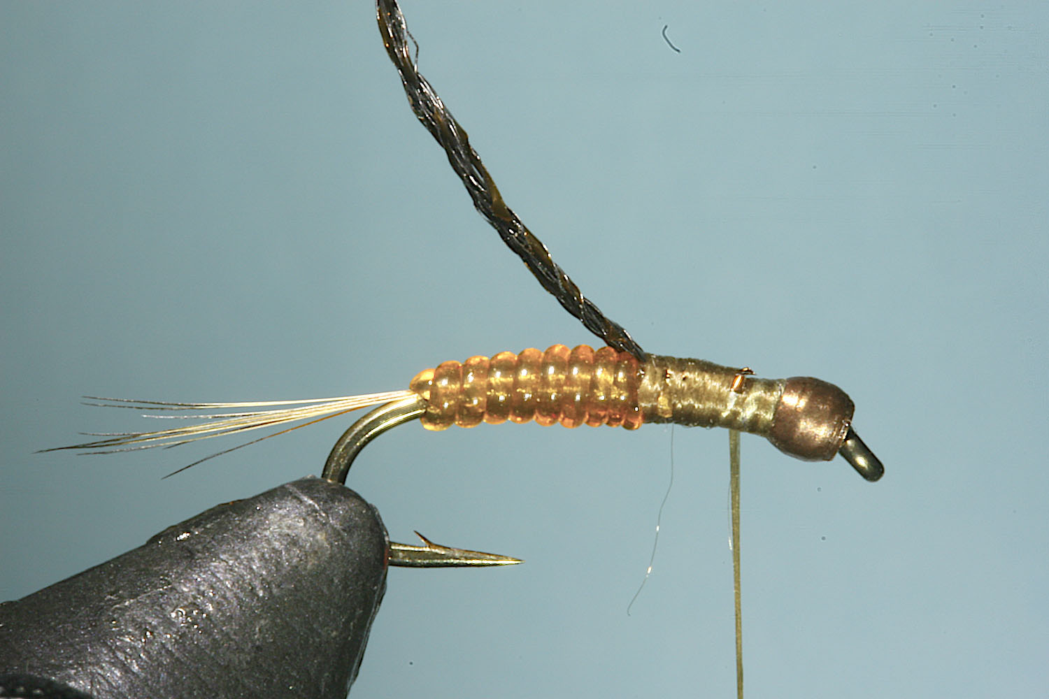 Step 6 of tying sequence for jelly crimp nymph fly
