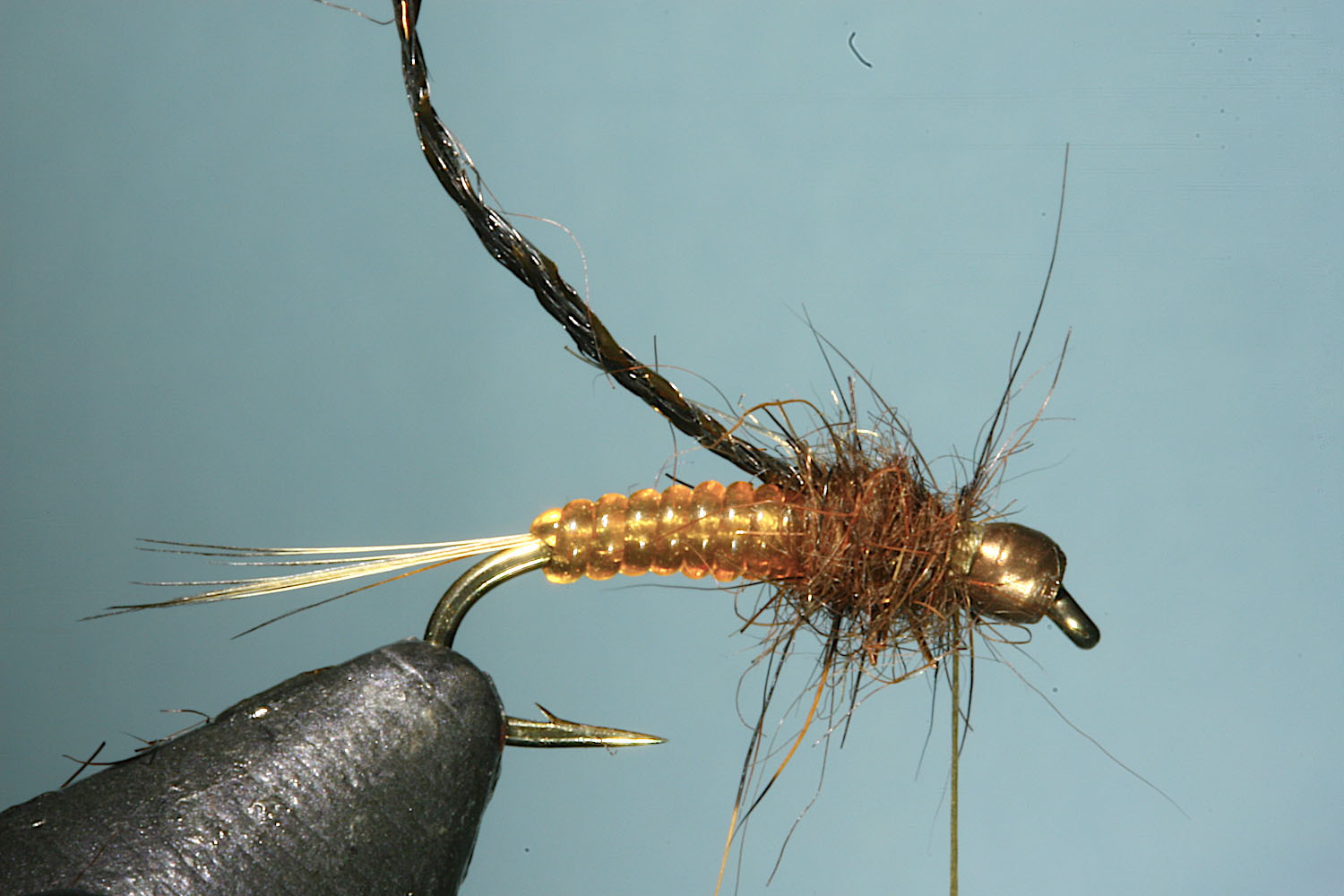 Step 7 of tying sequence for jelly crimp nymph fly