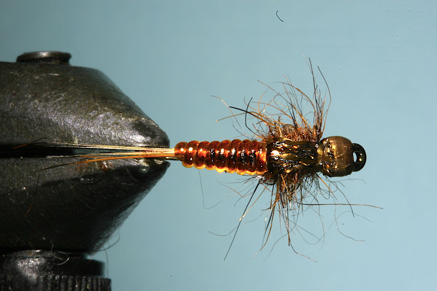 Step 9 of tying sequence for jelly crimp nymph fly