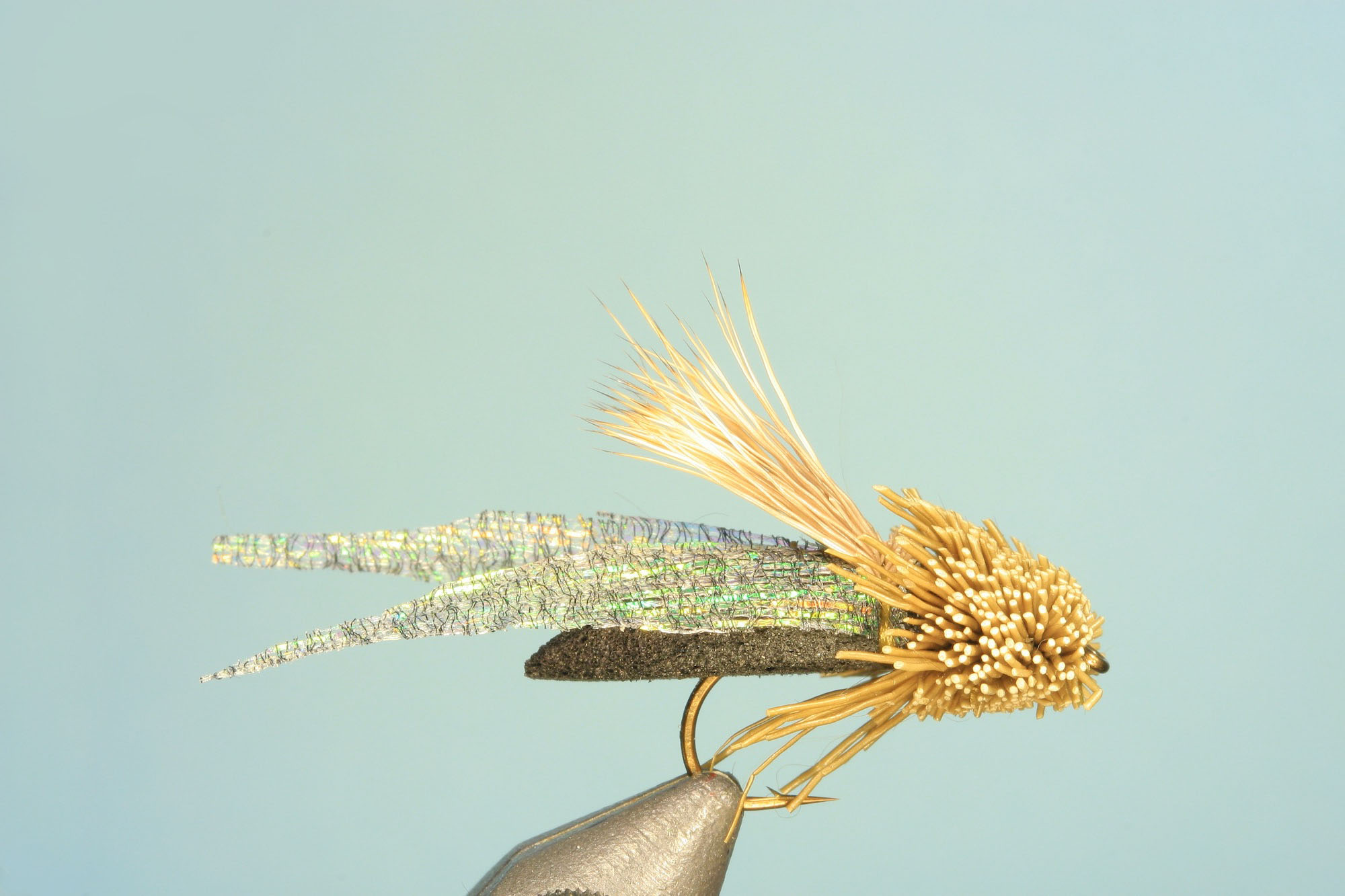 Close up of Silicone Wing Cicada, size 8, on a vise