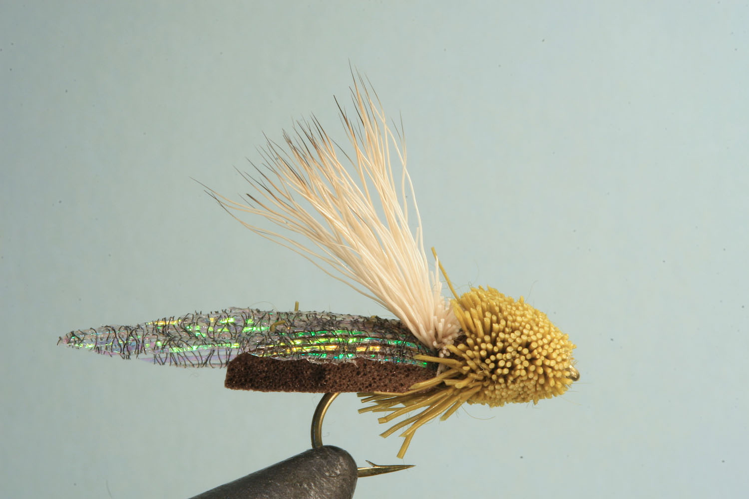 Close up of Silicone Wing Cicada, size 12, on a vise